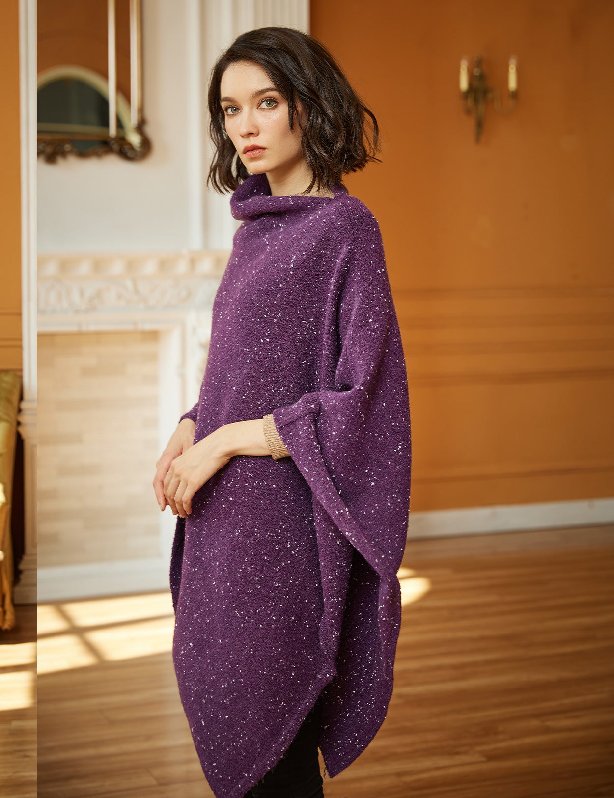 Poncho de punto acogedor con cuello de pelo