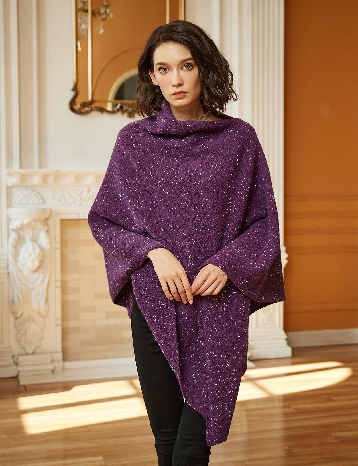 Poncho de punto acogedor con cuello de pelo
