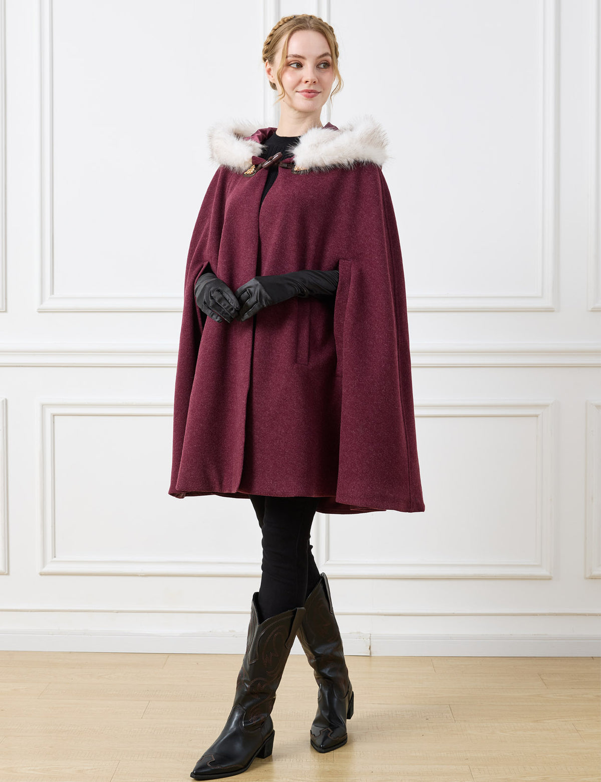 Beautelicate burgundy oversized wool cloak, highlighting a wind-protective wrapped structure and a fluid A-line cut, bringing unrestrictive old-world charm to your festive winter styling.
