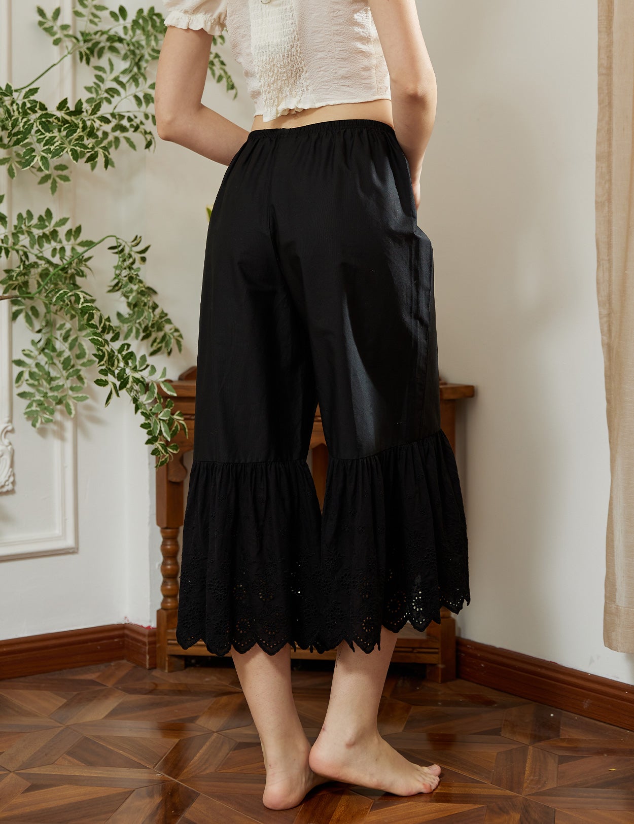 Back detail of black cotton batiste wide leg underpants with elastic waist for comfortable fit