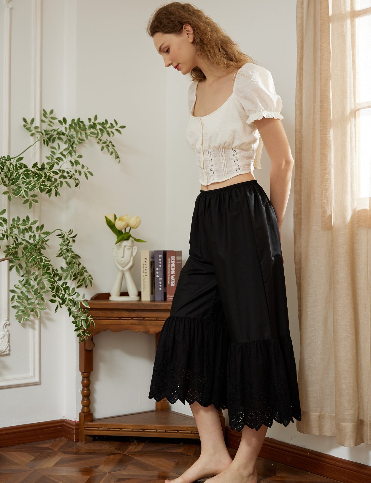 Black cotton batiste wide leg underpants with lace trim, showing elegant design