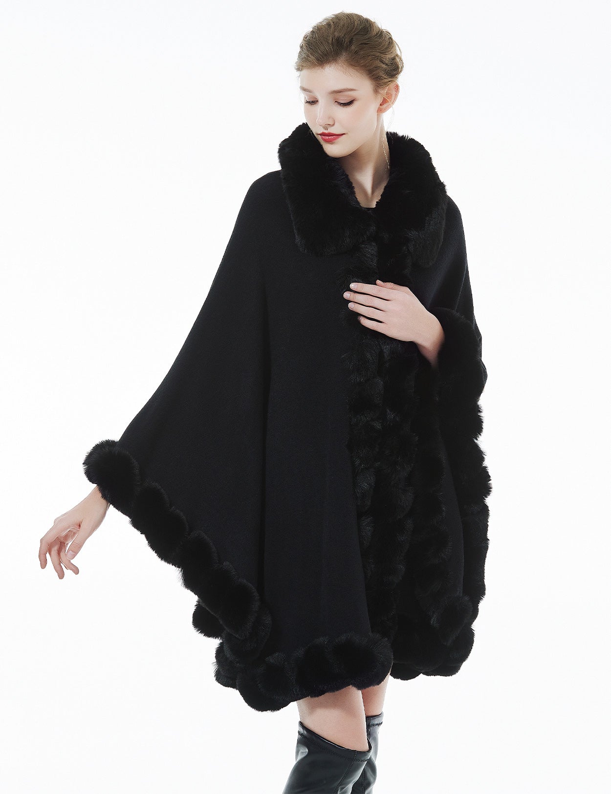 Trendy oversized knit cape coat with hood and faux fur trim