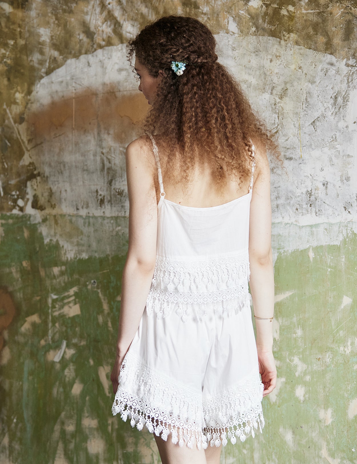 Women's boho crochet lace crop top in white with adjustable straps