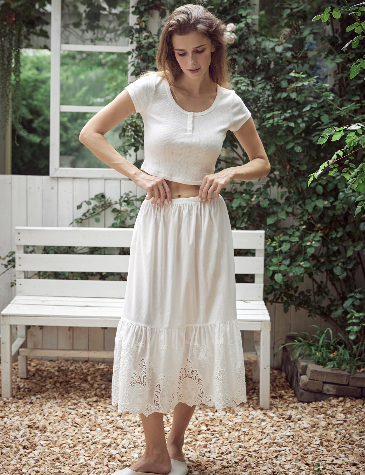 ivory cotton slip showing elegant silhouette and lace details