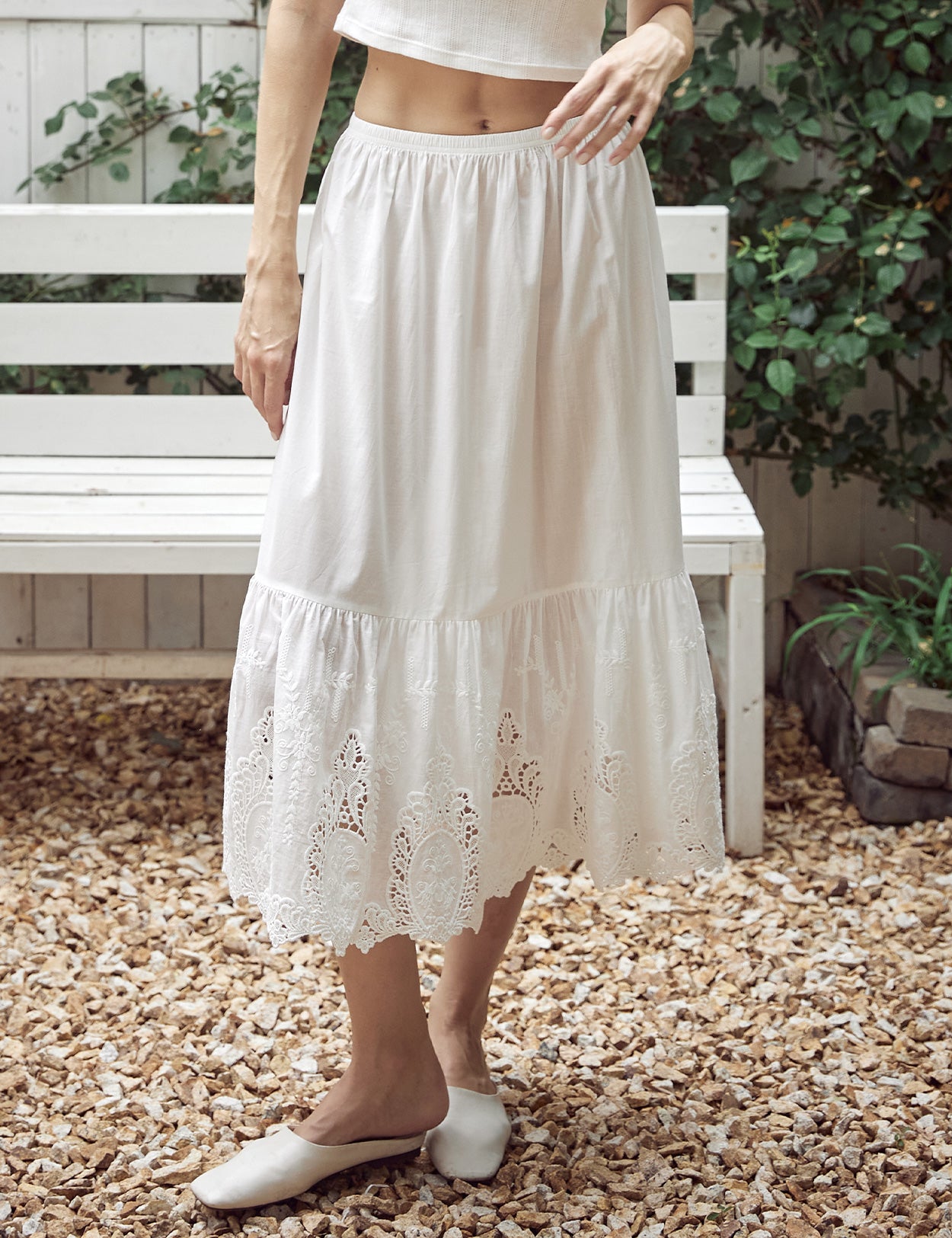 Ivory cotton slip with raised patterns and lace cutouts
