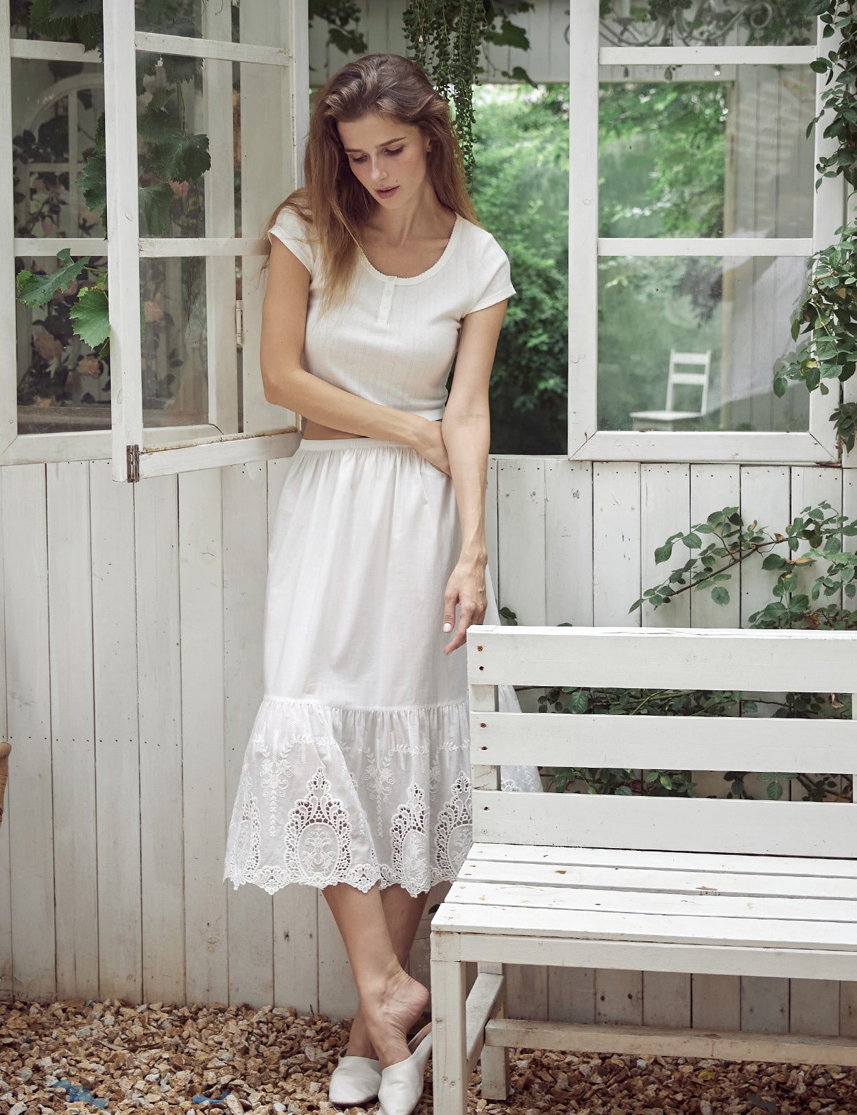 intricate lace cutout design on ivory cotton slip