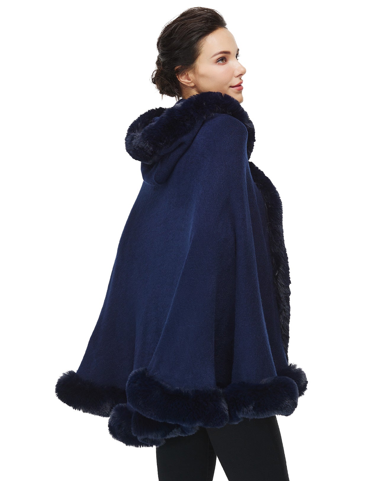 Women's faux fur poncho with hood showing elegant drape and texture