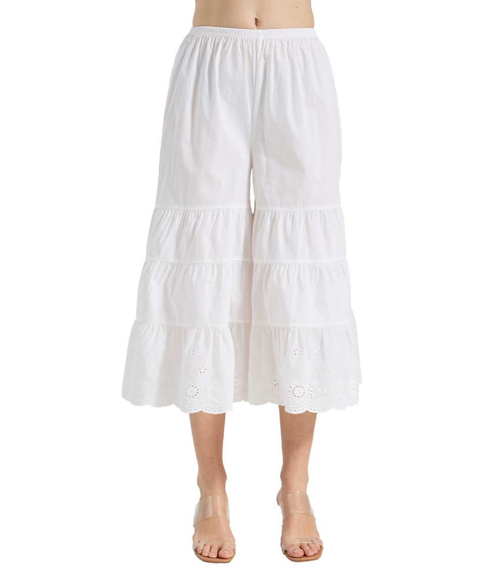Front view of ivory cotton tiered Victorian-style bloomers with ruffles and scalloped eyelet lace hem.