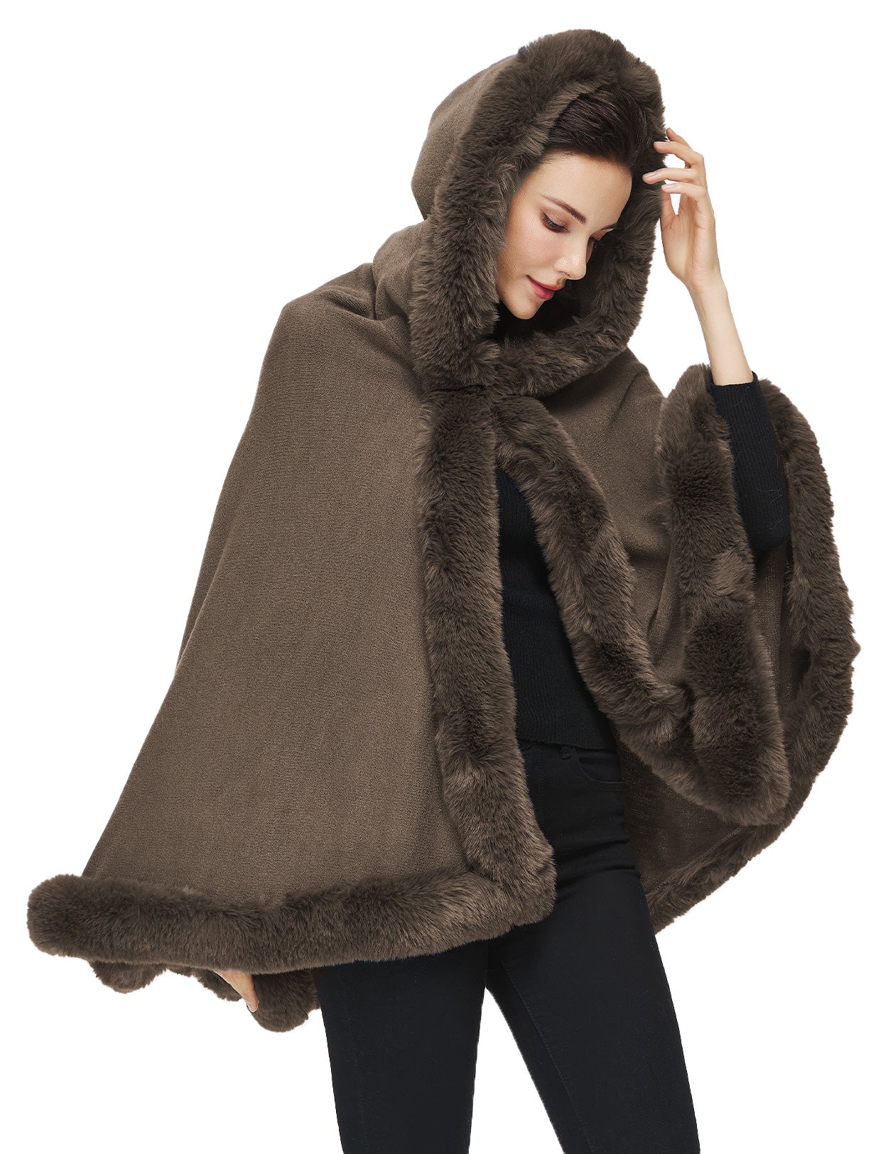 Women's faux fur poncho with hood showing elegant drape and texture