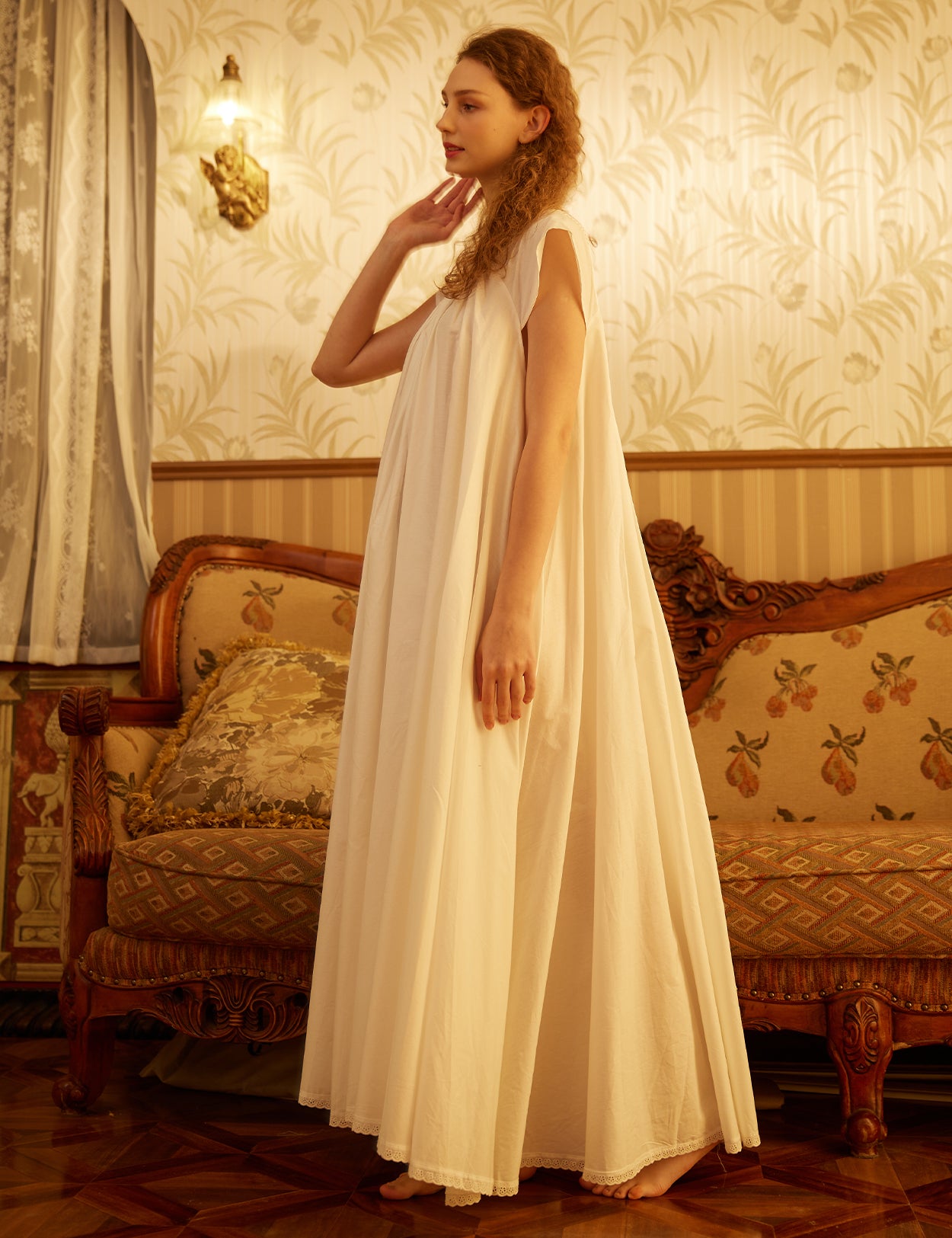 oversized Victorian maternity nightgown highlighting cape sleeves and graceful drape of A-line hem