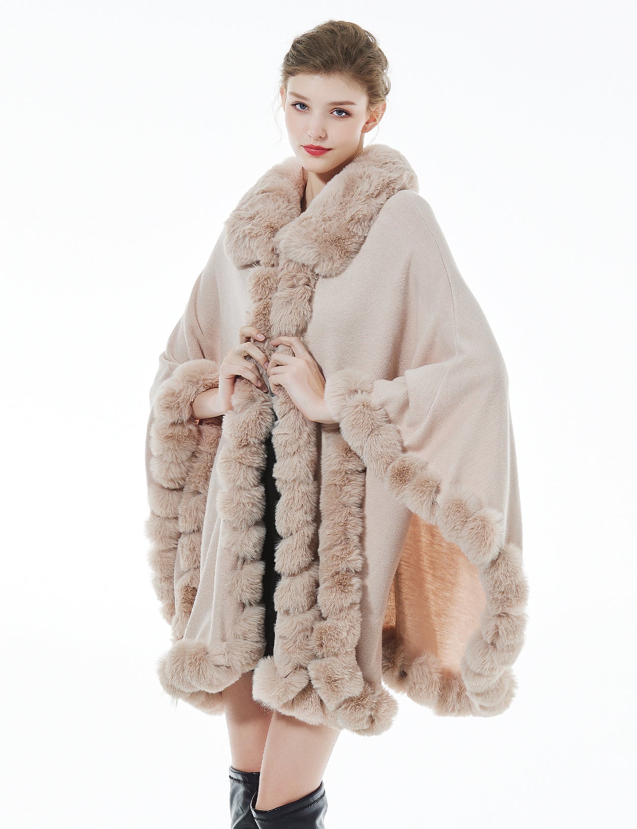 Trendy oversized knit cape coat with hood and faux fur trim