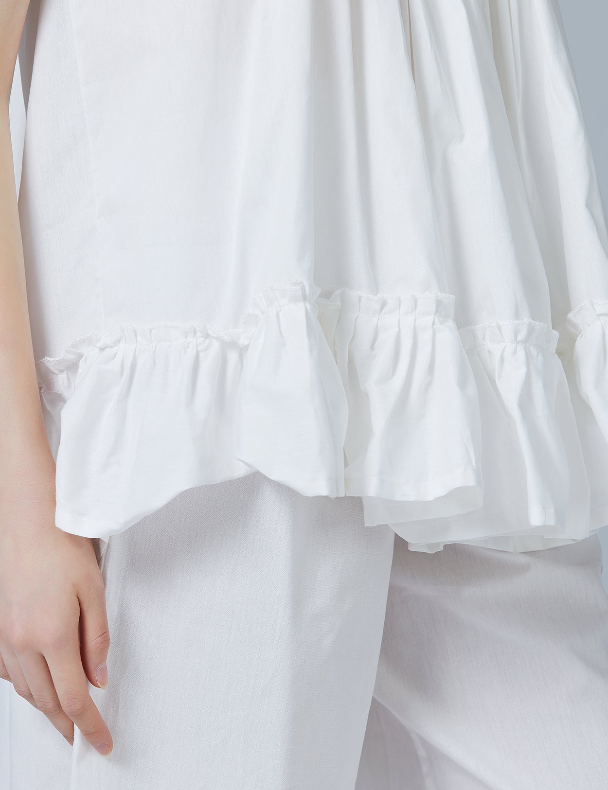 Close-up view of women's cotton pajama set showing fabric texture