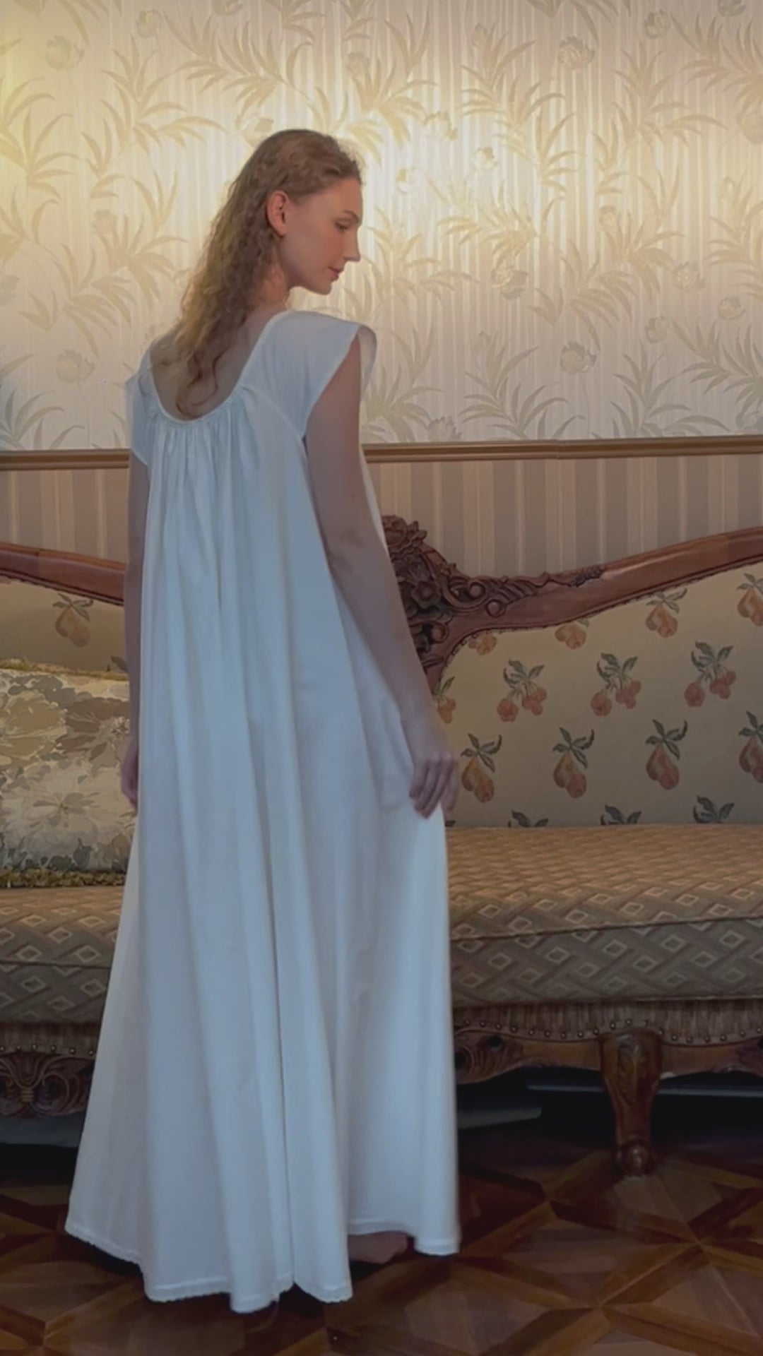 Long oversized Victorian maternity cotton nightgown in white with lace trim, front view showing U-neck design and flowing A-line silhouette