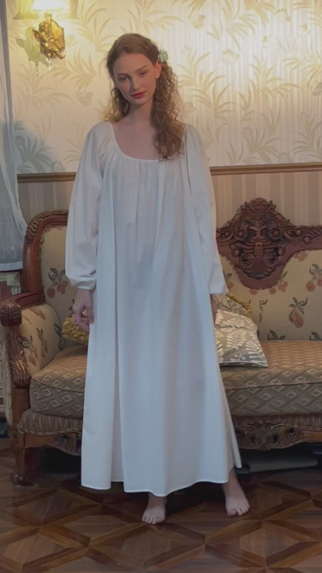 Vintage Victorian long sleeve cotton nightgown in white, featuring elegant U-collar design with delicate elastic trim