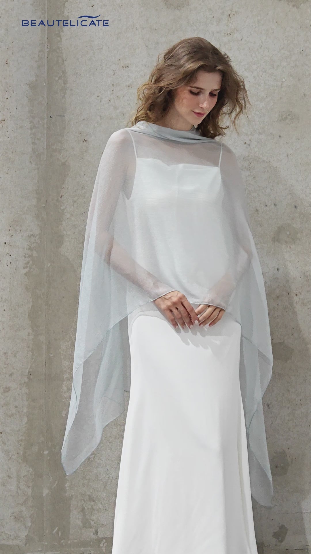 Lightweight sheer bridesmaid shawl in elegant draping style for wedding ceremonies