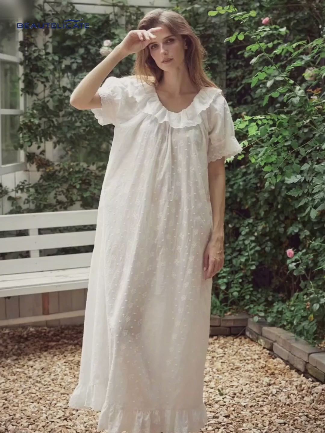 White Victorian cotton lace nightgown with ruffled sleeves and delicate embroidery