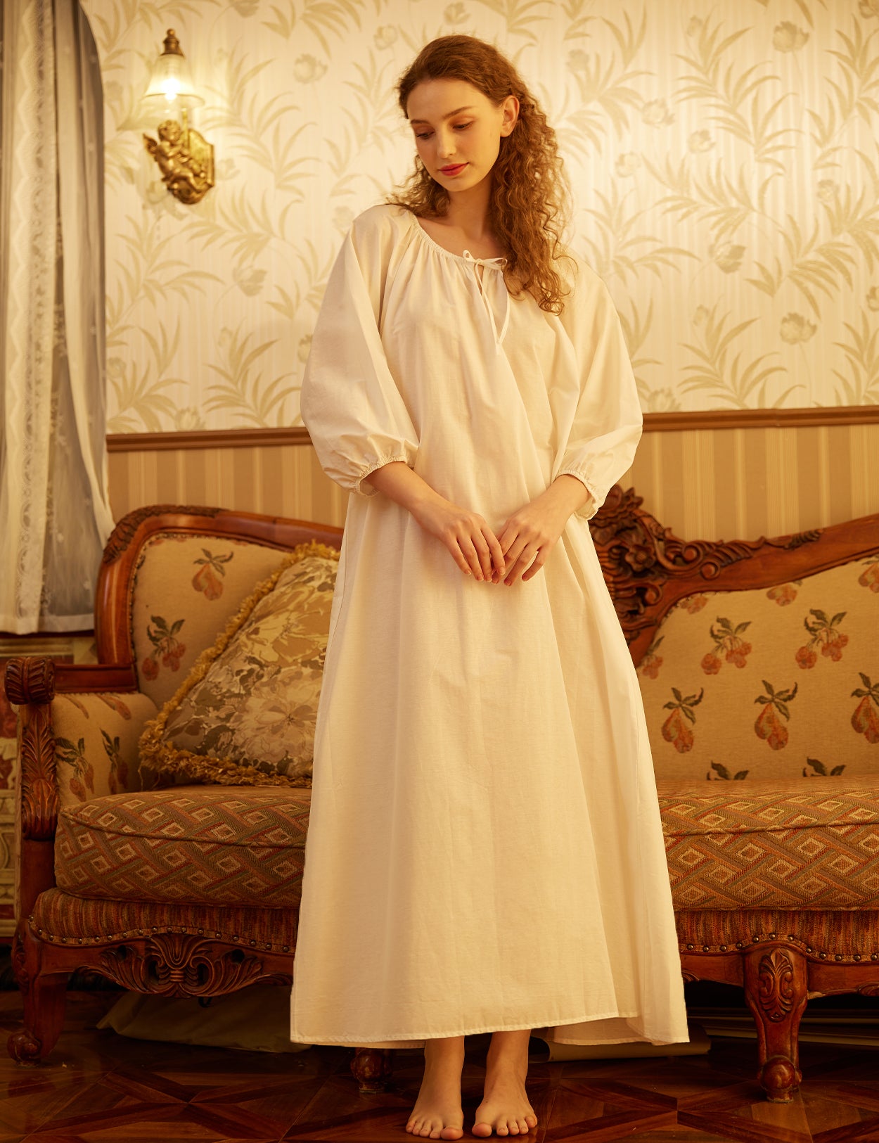 White Victorian maxi nightgown with long trumpet sleeves made from 100% cotton