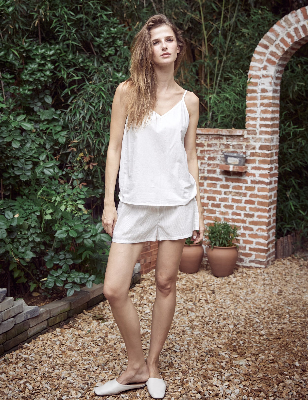 Adjustable strap 100% cotton camisole top in off white color