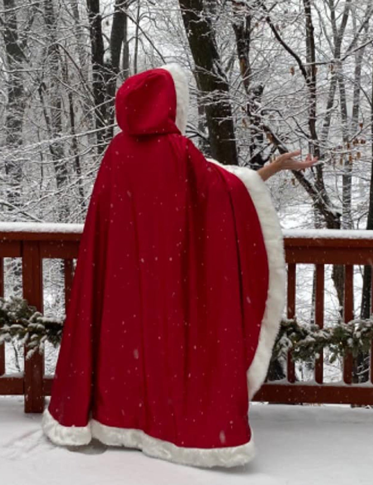 Reversible wedding cape with fur trim and hood customers wearing effect