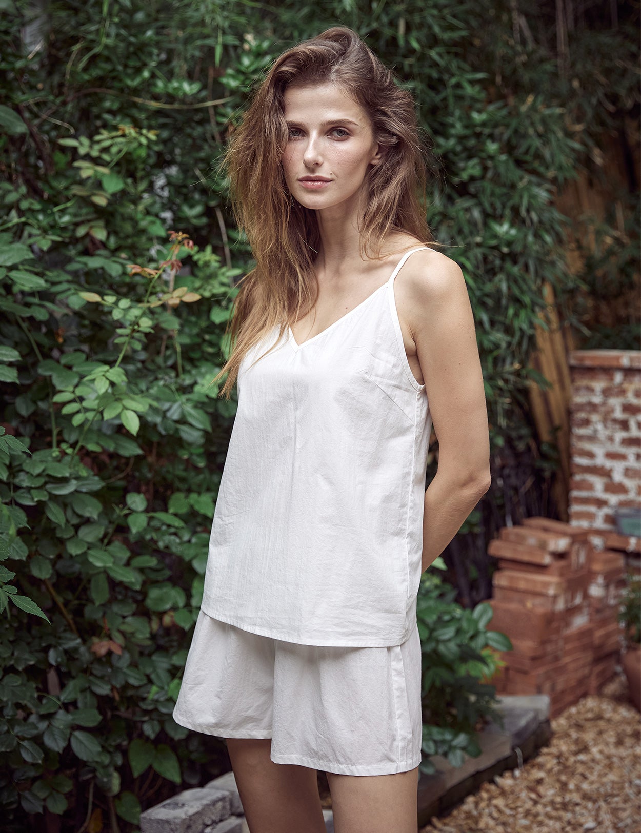 Adjustable strap 100% cotton camisole top in off white color