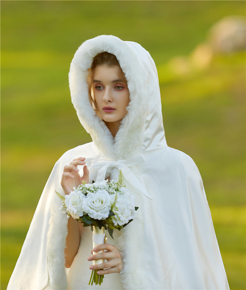 Elegant reversible bridal cape with hooded design and luxurious fur trim
