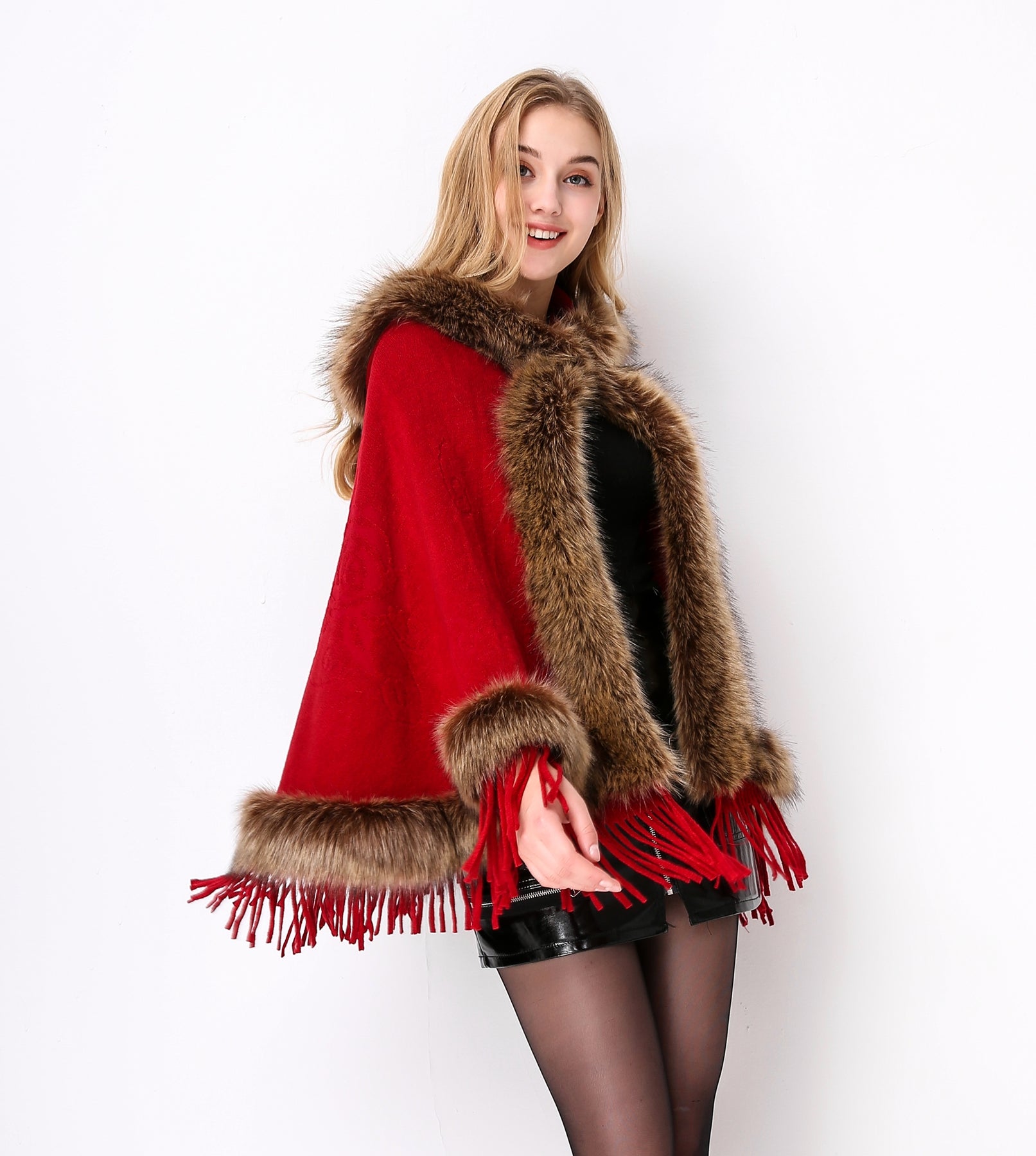 Luxury faux fur hooded cape showing elegant draping and soft texture