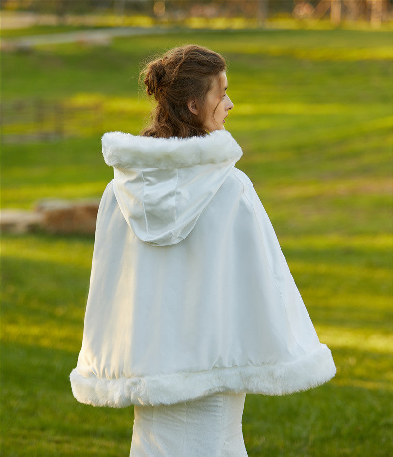 Elegant reversible bridal cape with hooded design and luxurious fur trim