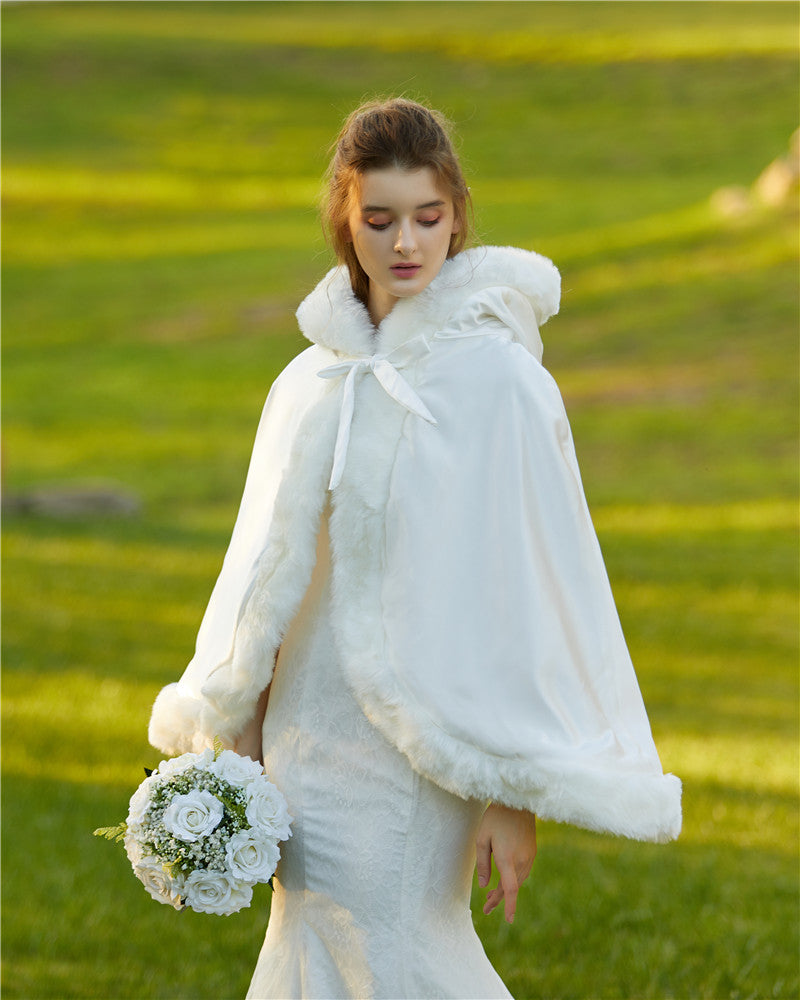 Elegant reversible bridal cape with hooded design and luxurious fur trim