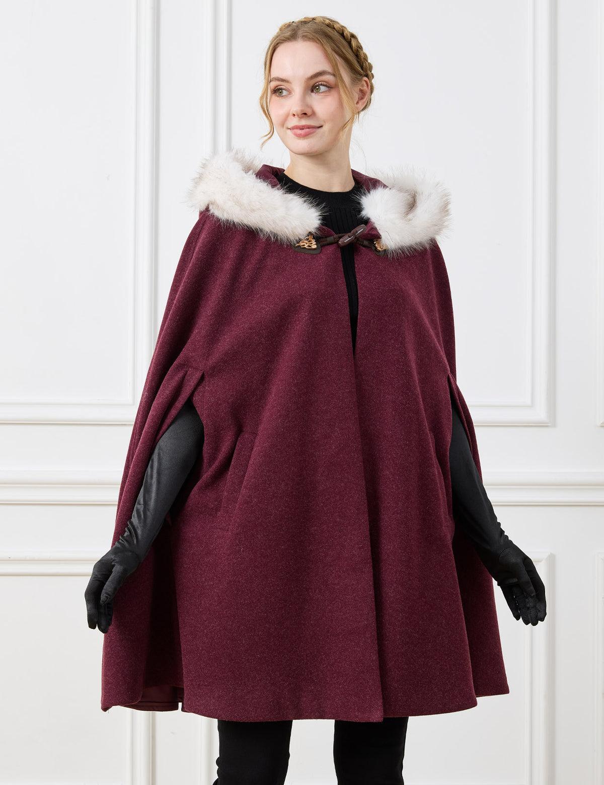 Beautelicate burgundy winter cloak, featuring ergonomic vertical arm slits and a plush faux fur trim, designed for an elegant and comfortable silhouette in your romantic cold-weather wardrobe.