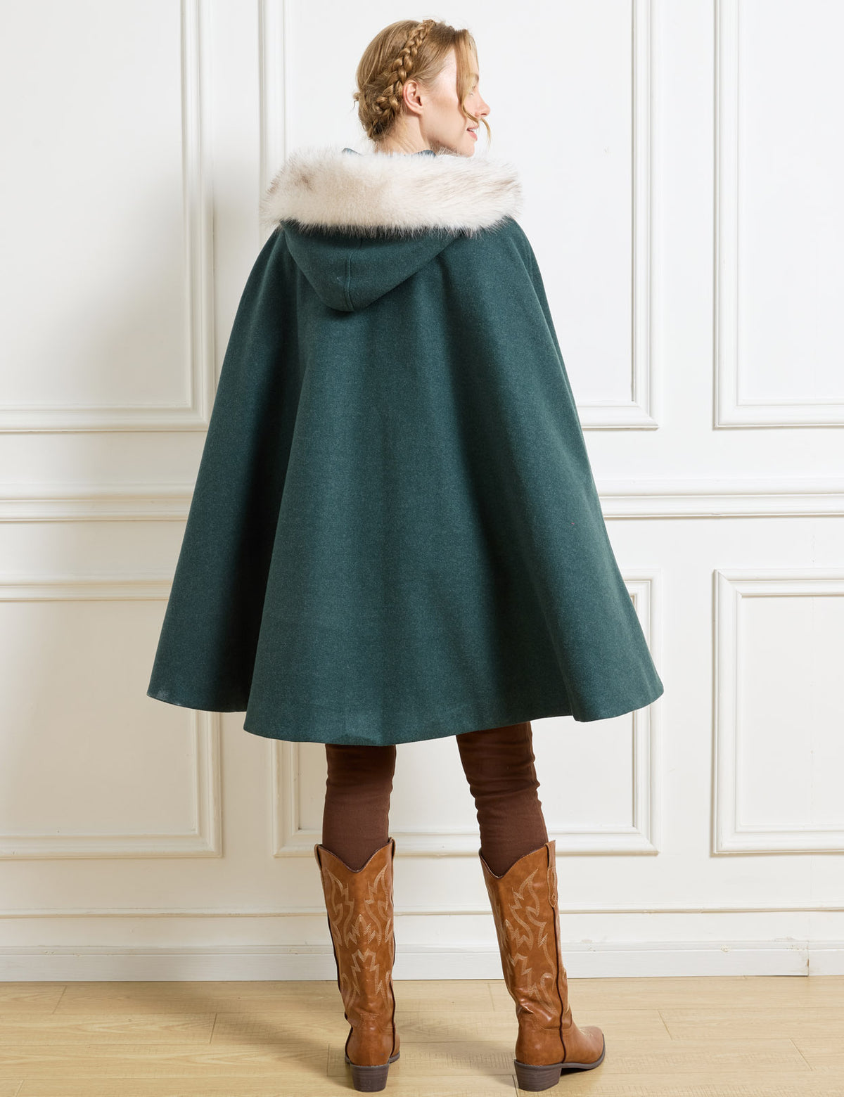 Beautelicate forest green winter cloak, highlighting a plush faux fur hood and a seamless deep back drape, capturing an elegant and unrestrictive Renaissance Faire silhouette.