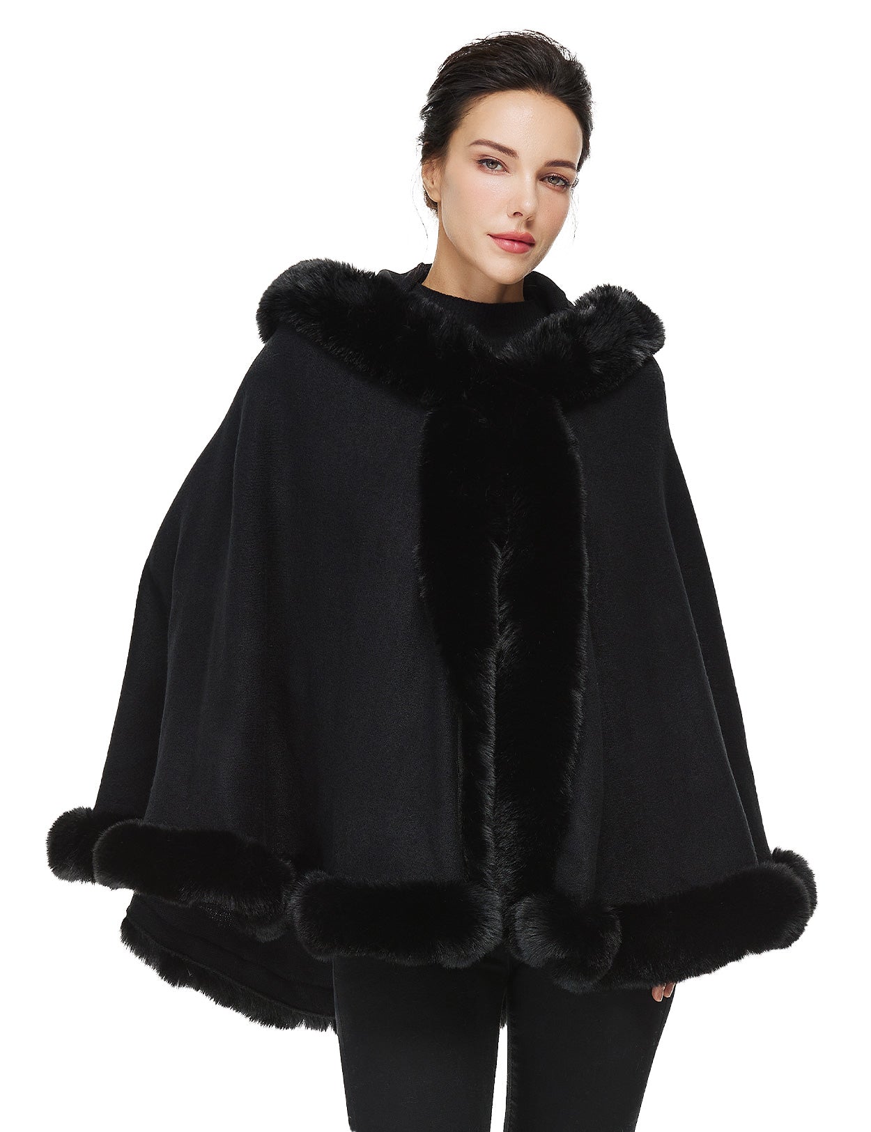 Women's faux fur poncho with hood showing elegant drape and texture