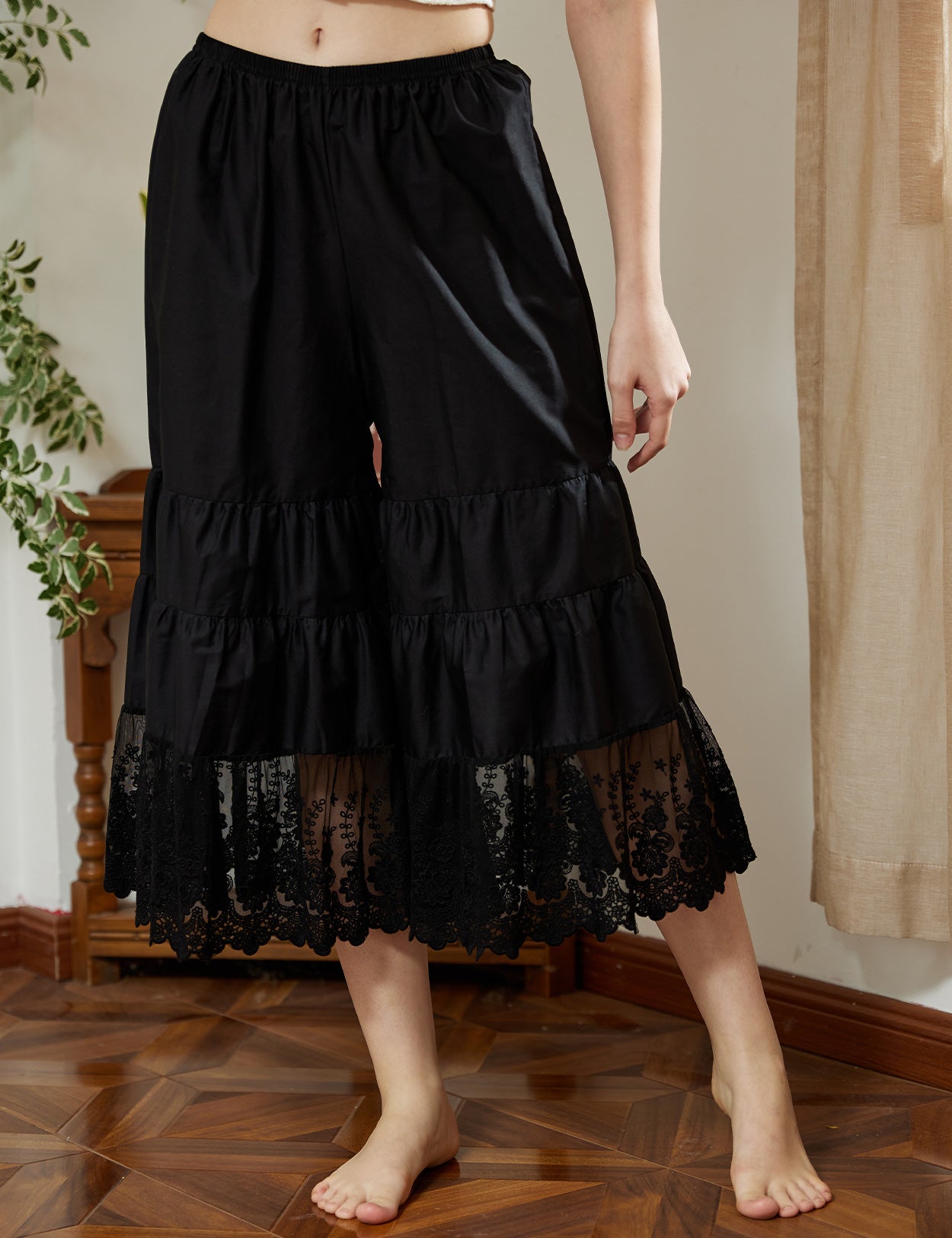 Close-up detail of women's cotton batiste pettipants showing lace trim and fabric texture