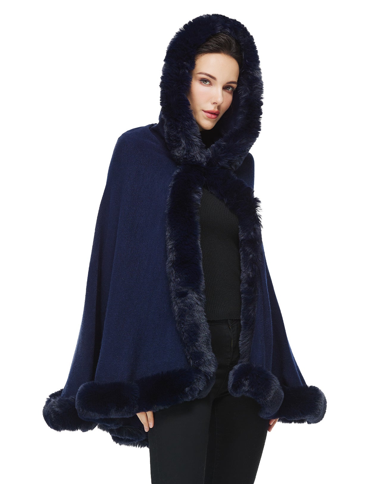 Women's faux fur poncho with hood showing elegant drape and texture