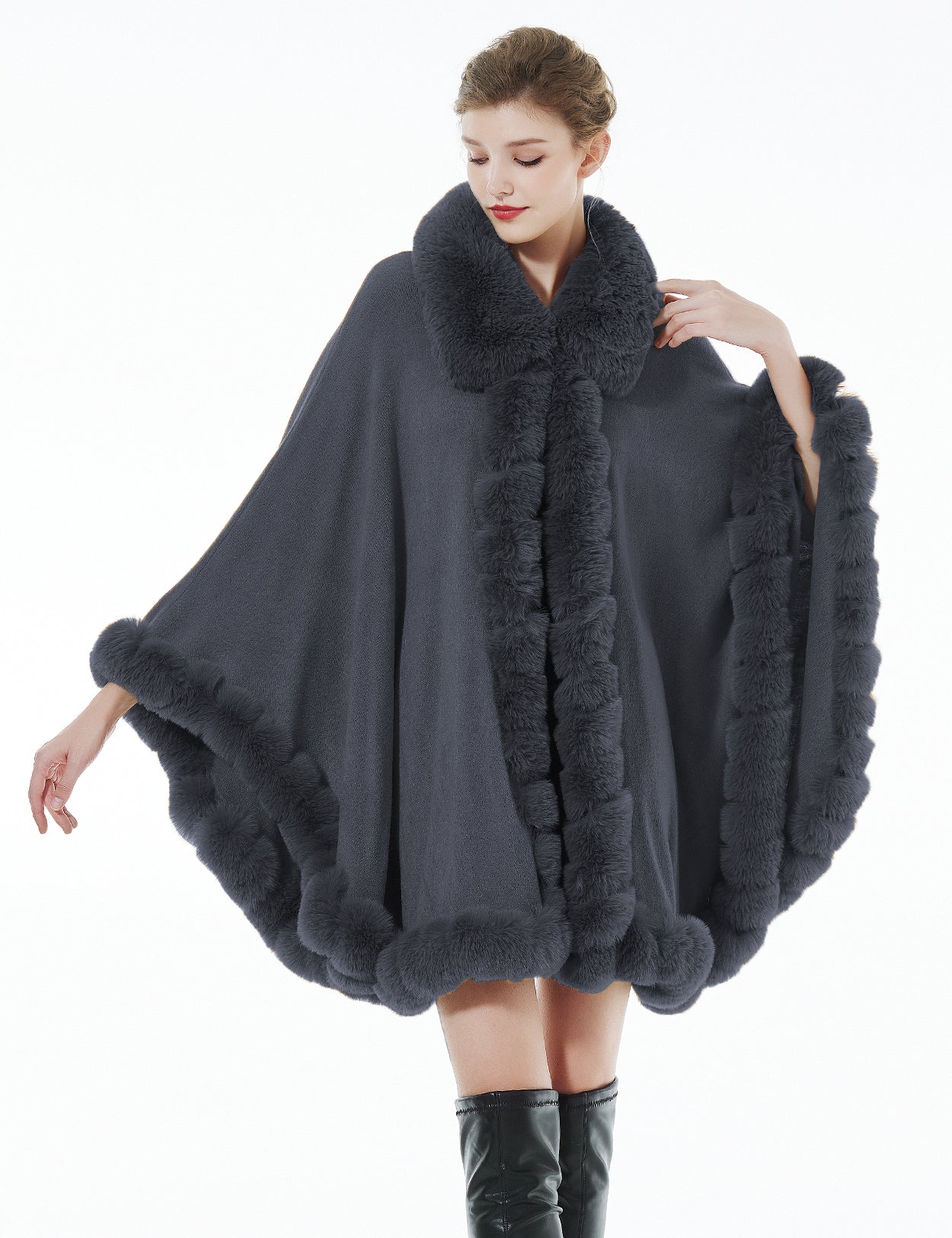 Trendy oversized knit cape coat with hood and faux fur trim