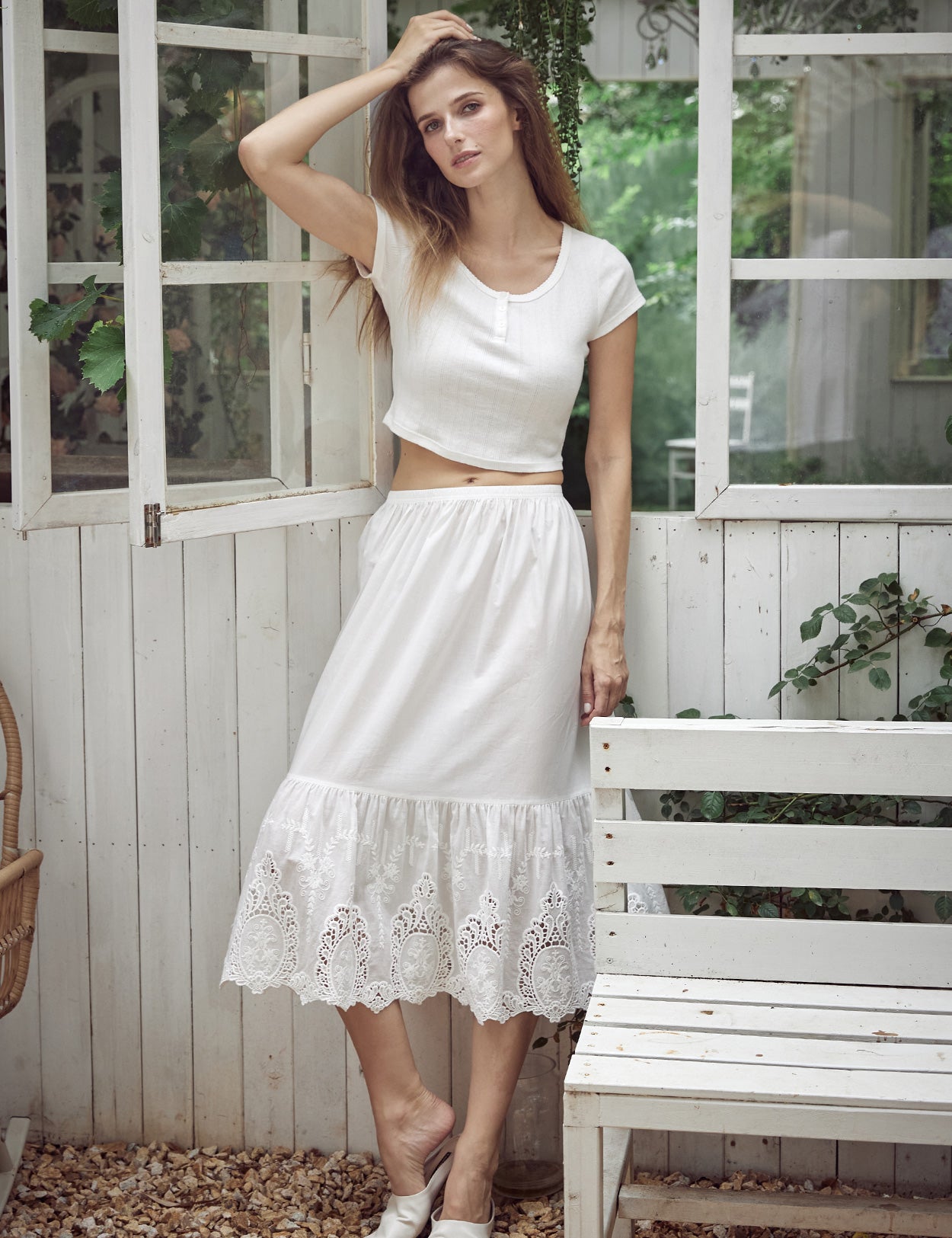 ivory cotton slip with raised patterns and lace cutouts