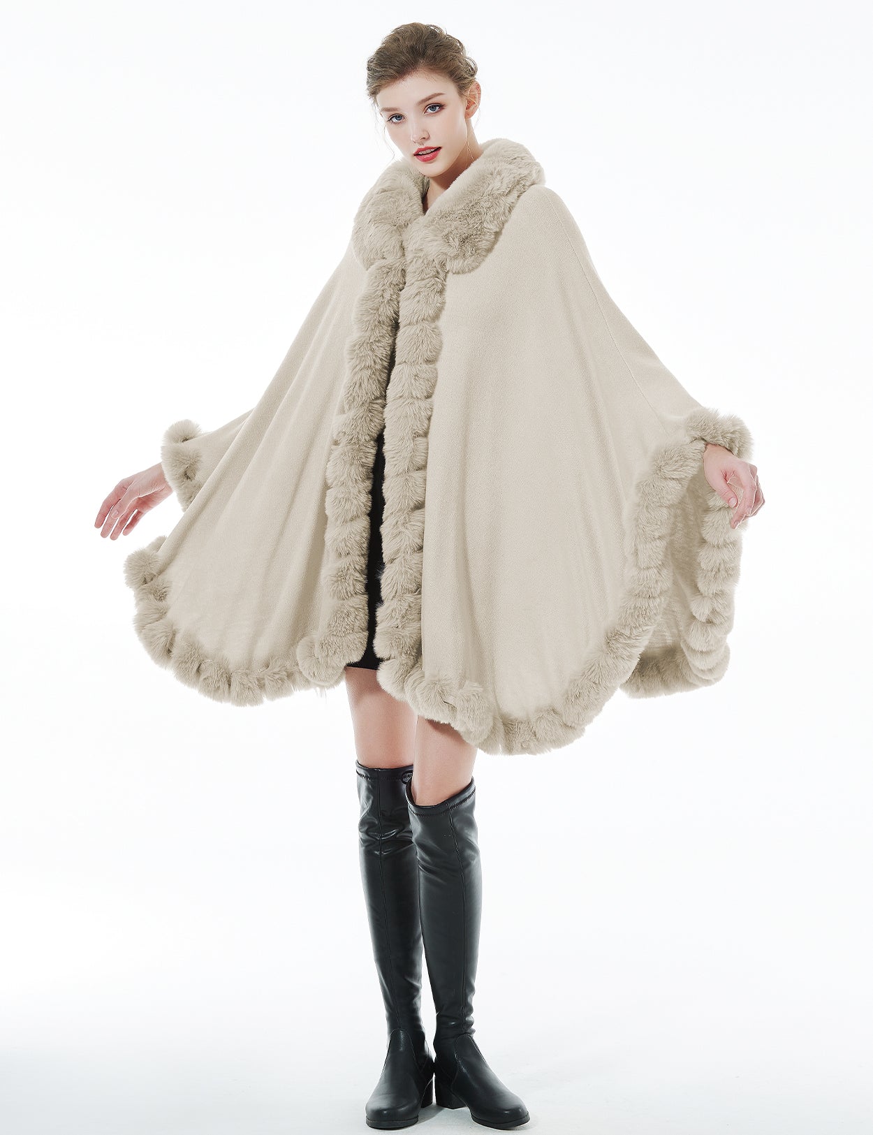 Trendy oversized knit cape coat with hood and faux fur trim
