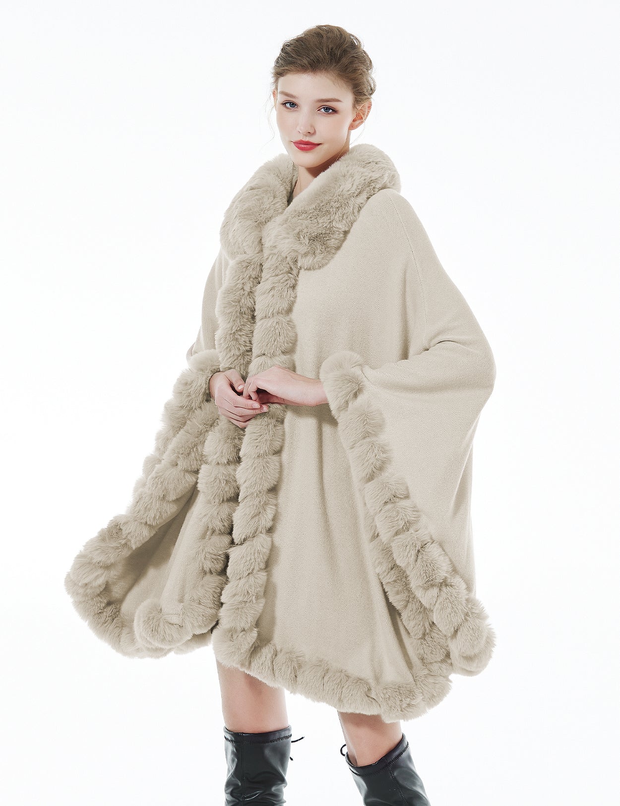 Trendy oversized knit cape coat with hood and faux fur trim