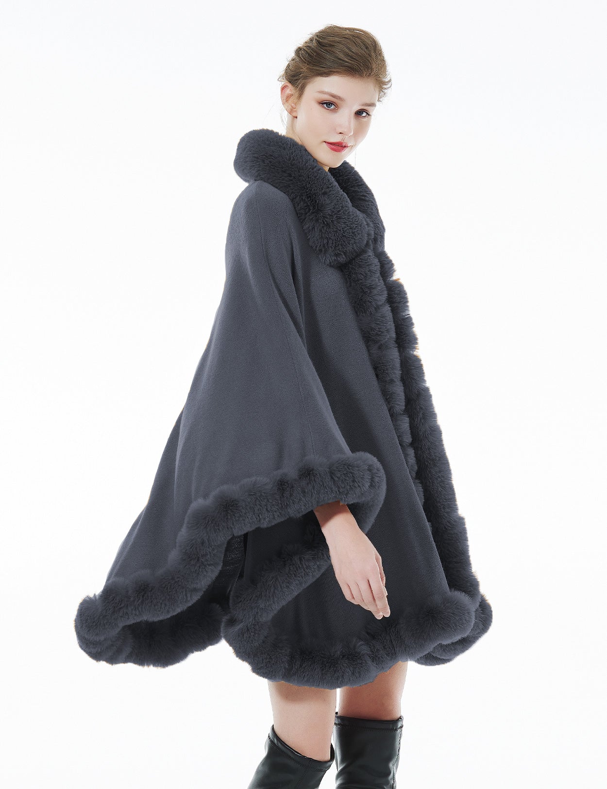 Trendy oversized knit cape coat with hood and faux fur trim