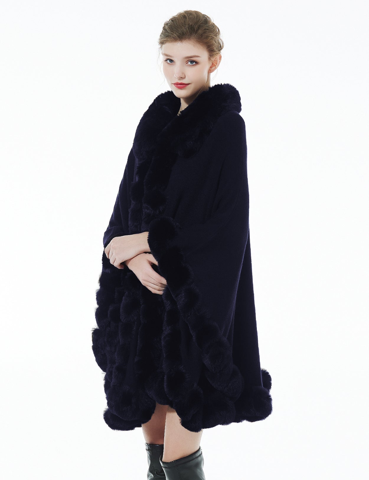 Trendy oversized knit cape coat with hood and faux fur trim