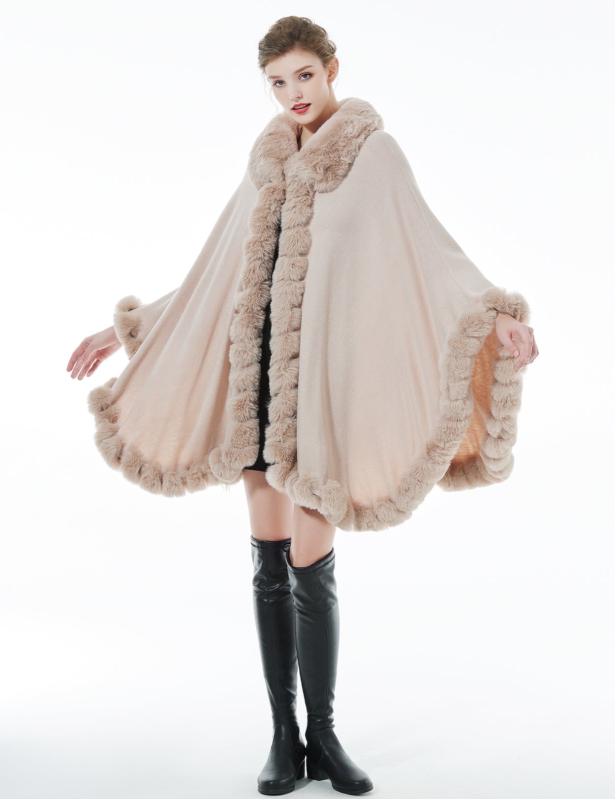 Trendy oversized knit cape coat with hood and faux fur trim
