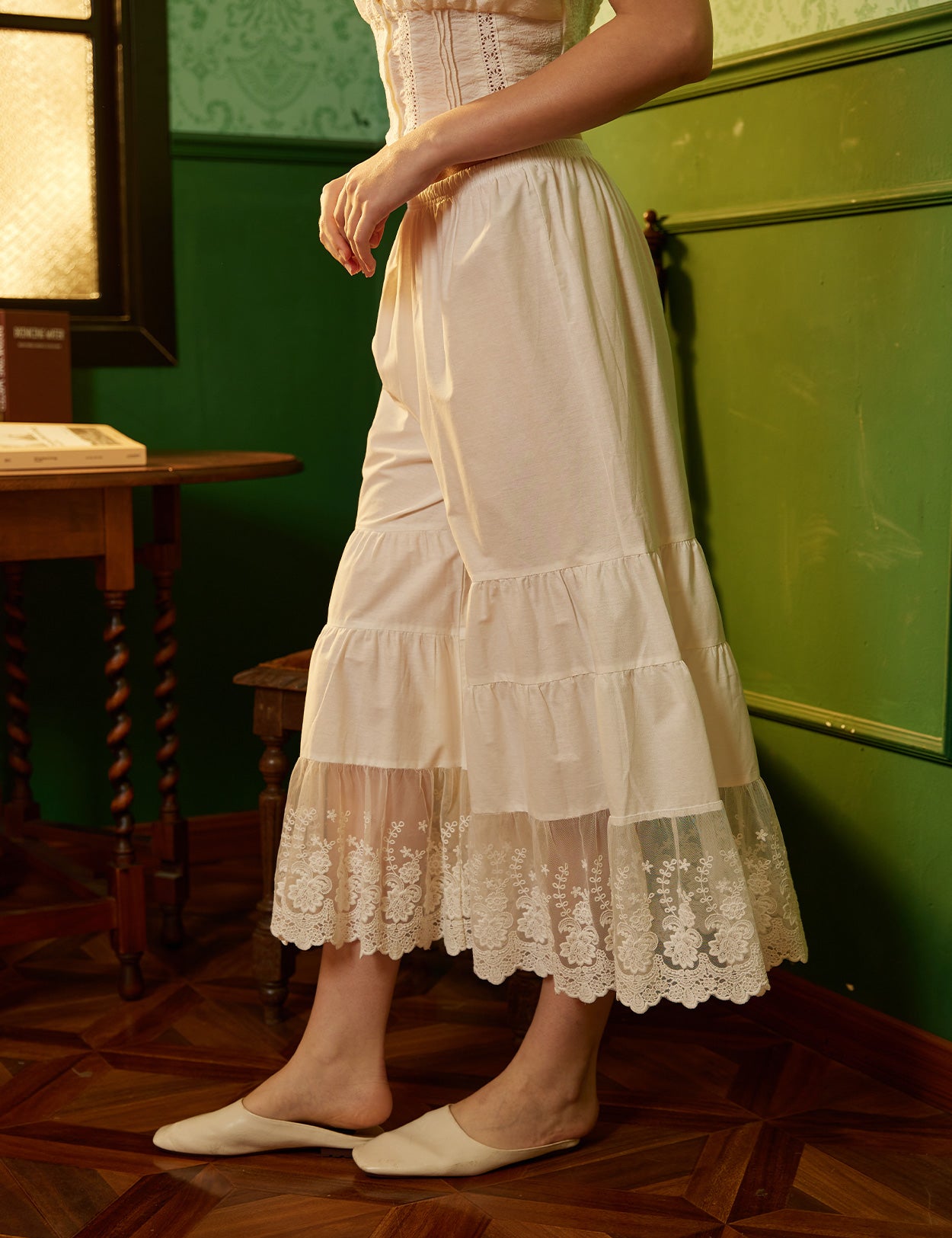 Side view of women's vintage cotton pettipants with wide leg design and elastic waist