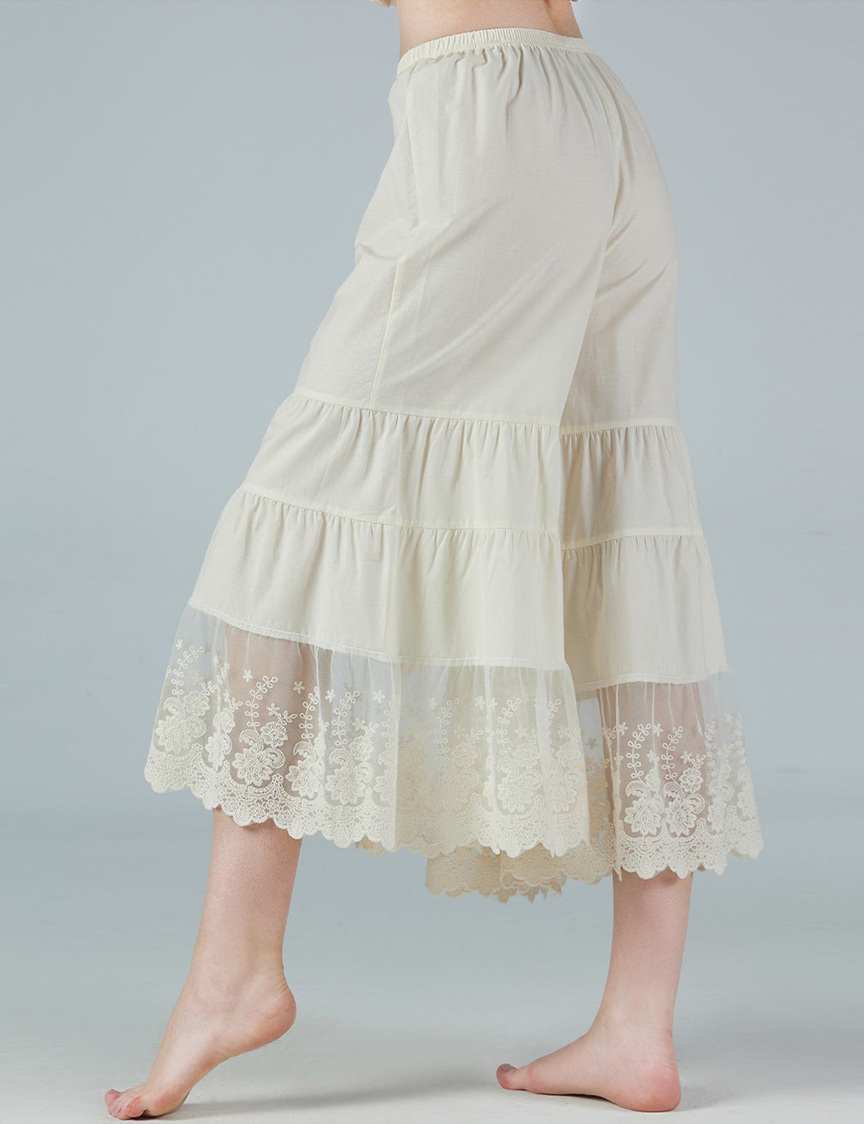 Side view of women's vintage cotton pettipants with wide leg design and elastic waist