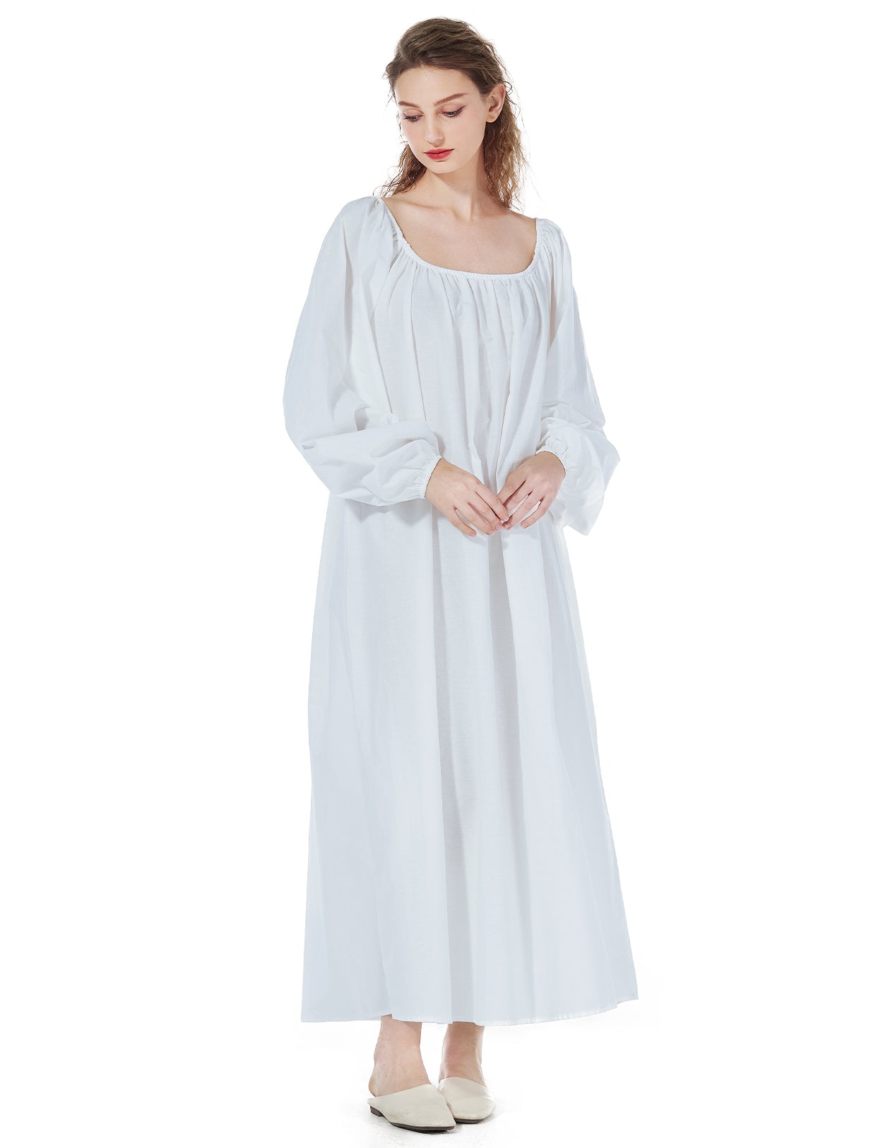 Vintage Victorian long sleeve cotton nightgown in white, featuring elegant U-collar design with delicate elastic trim, front view