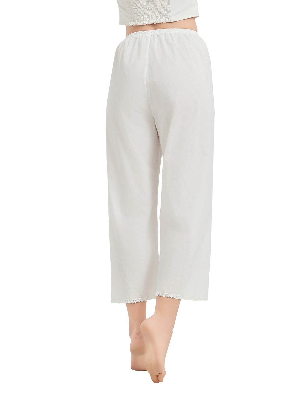 Back view of cotton pettipants showing lace trim, elastic waistband, and fabric texture