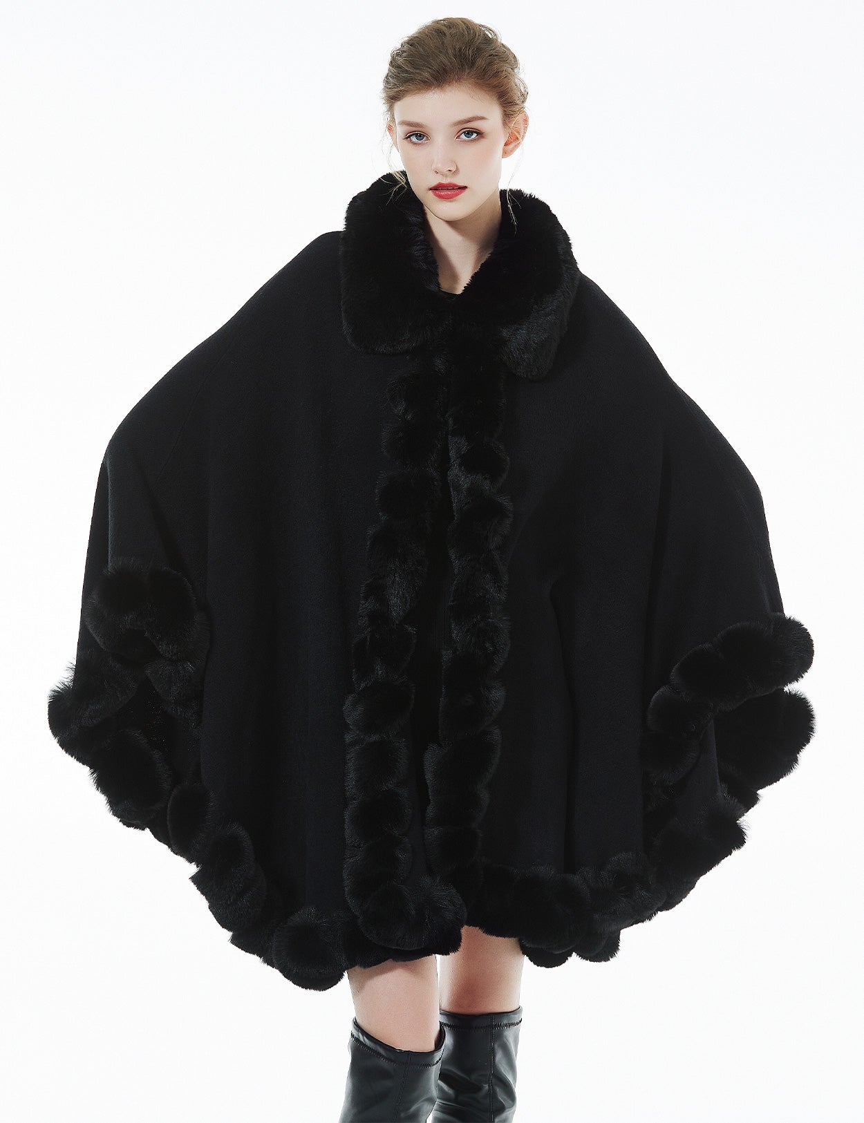 Trendy oversized knit cape coat with hood and faux fur trim