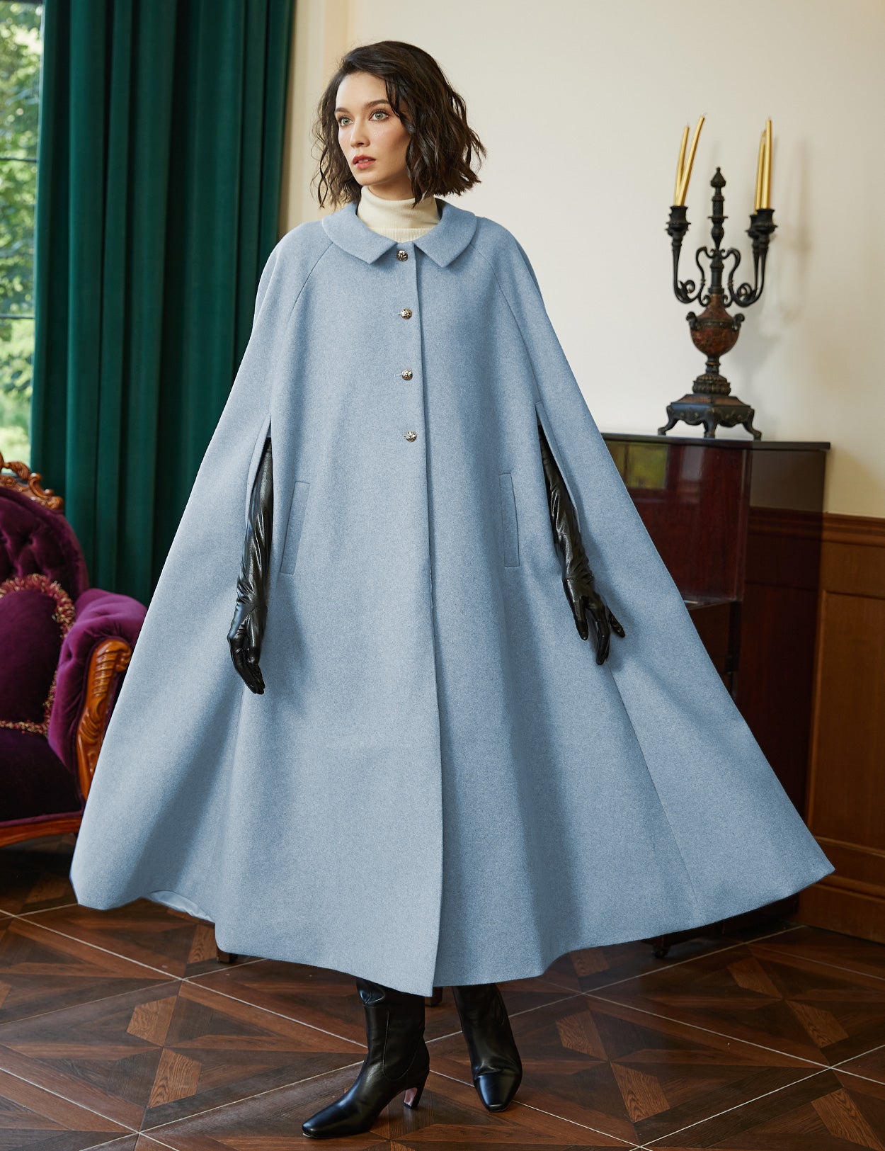 Wool blend cloak with slit sleeves and pockets - front view showing elegant winter cape design