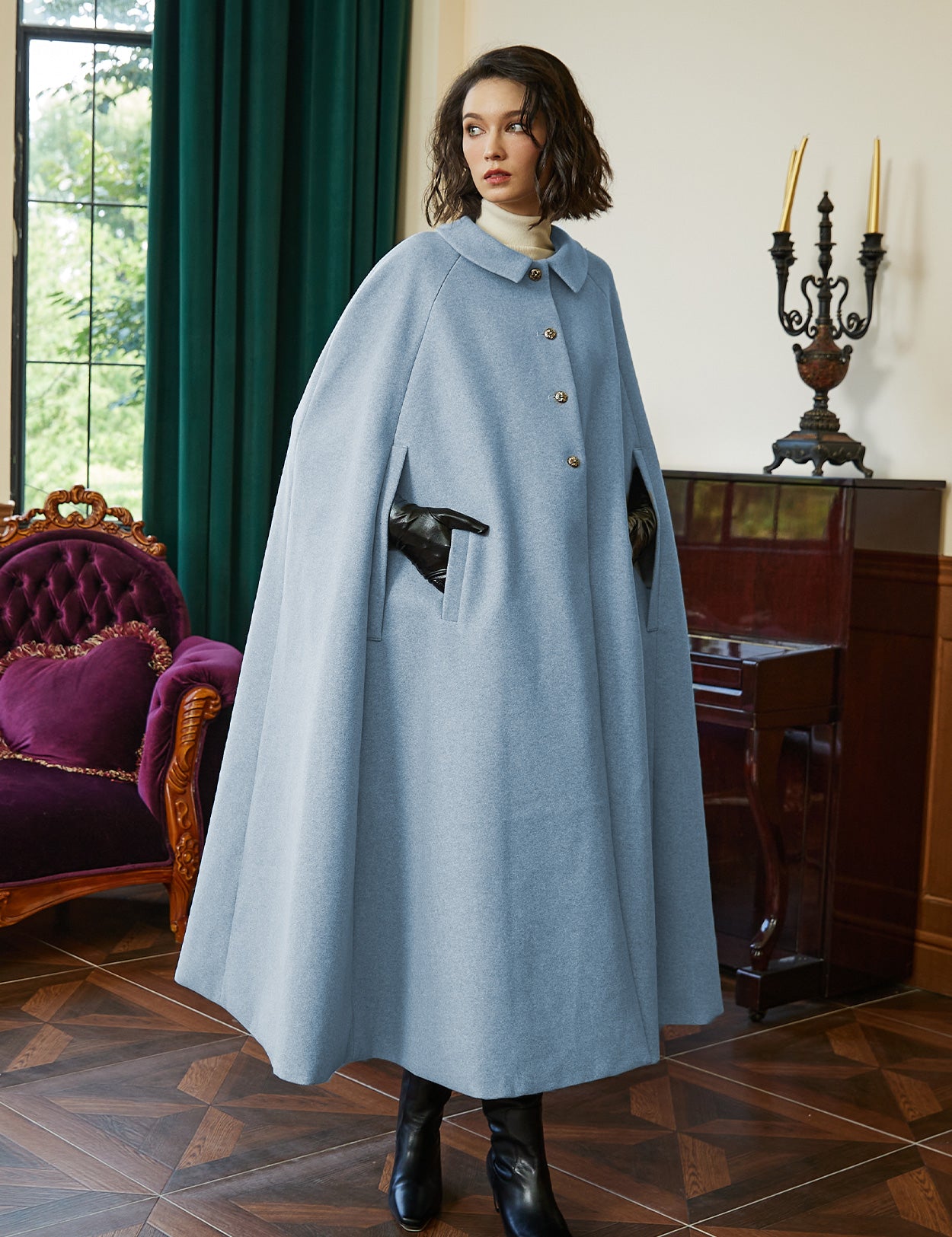 Wool blend cloak with slit sleeves and pockets - front view showing elegant winter cape design