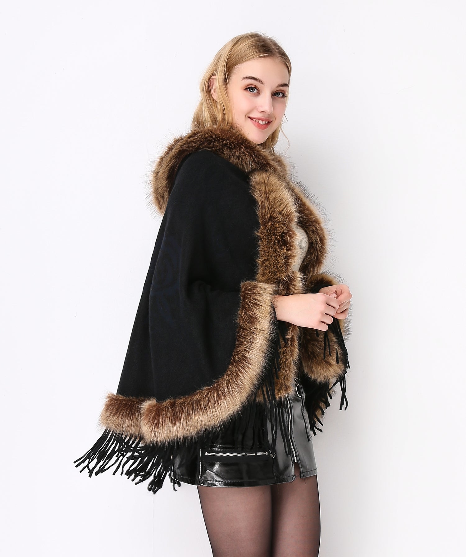 Luxury faux fur hooded cape showing elegant draping and soft texture