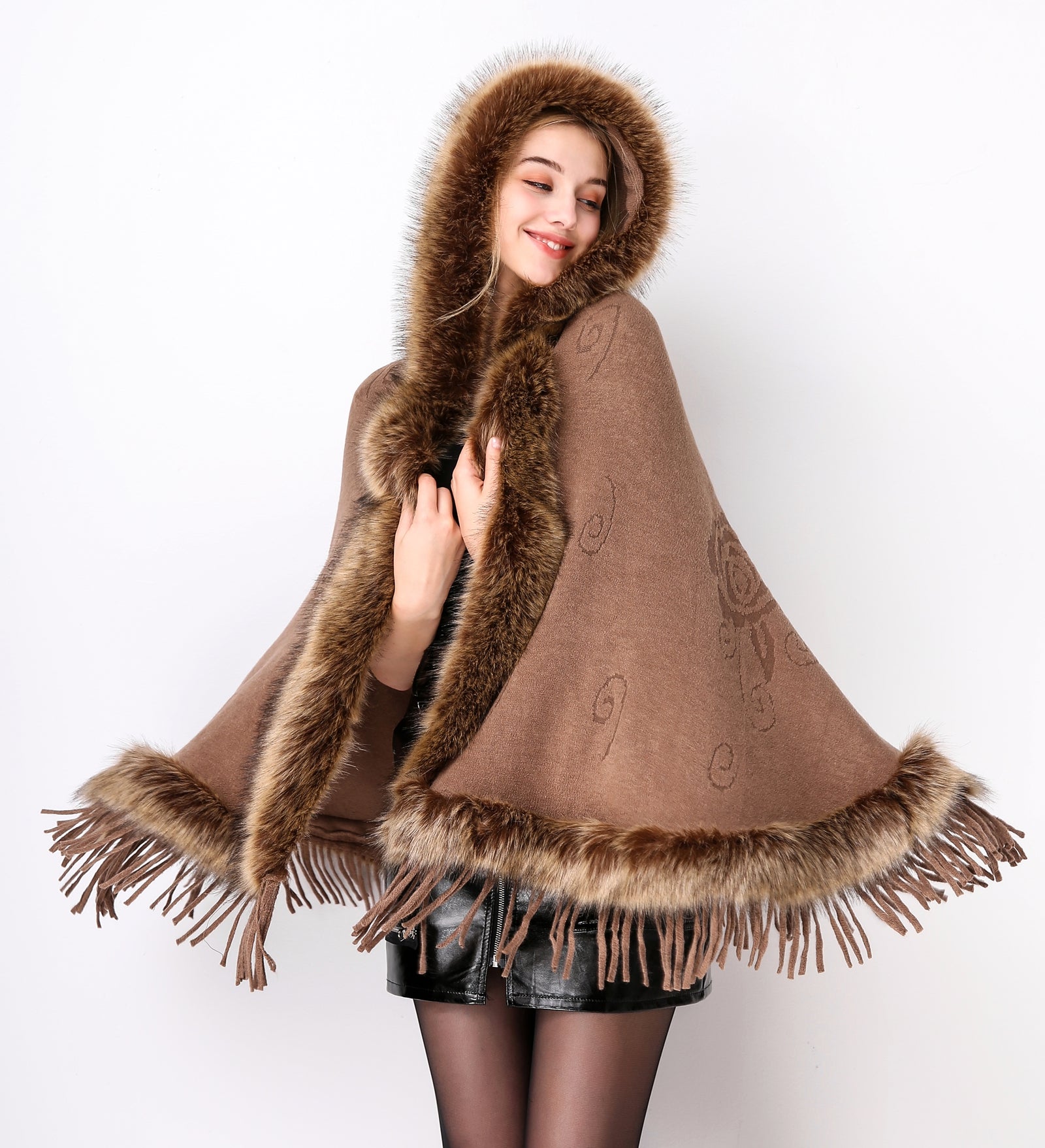 Luxury faux fur hooded cape showing elegant draping and soft texture